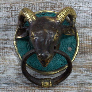 brass door knocker rams head